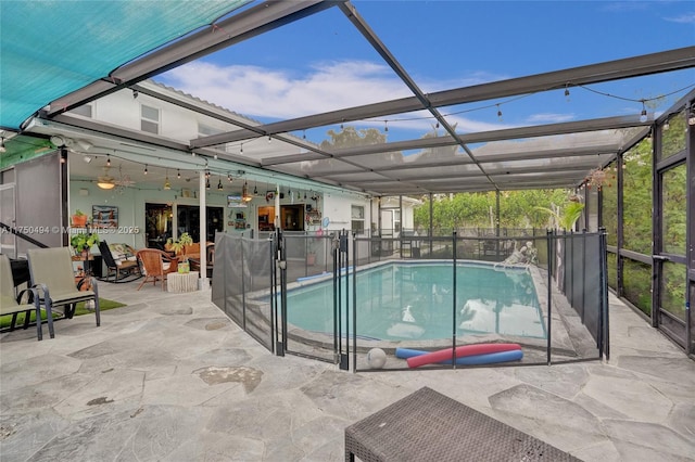 view of pool featuring a patio, a lanai, and a fenced in pool