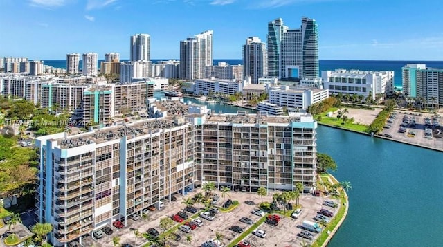 aerial view with a water view and a city view