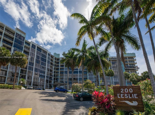 view of property with uncovered parking