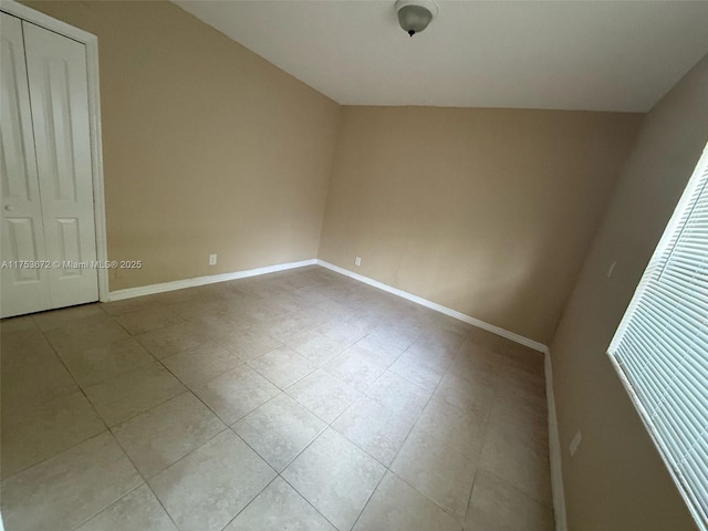 empty room with baseboards