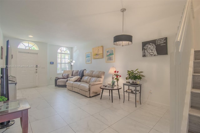 living room featuring baseboards