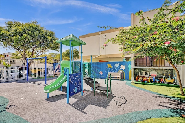 community playground featuring fence