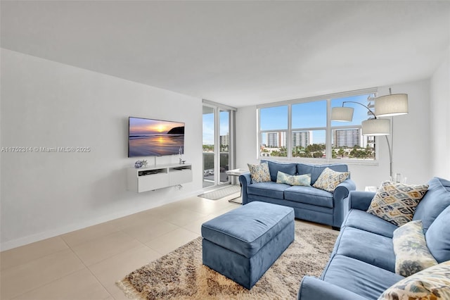 tiled living area with a wealth of natural light and baseboards