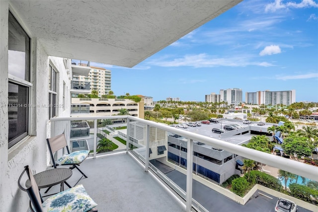 balcony featuring a city view