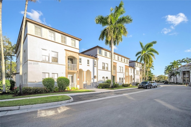 view of building exterior with a residential view