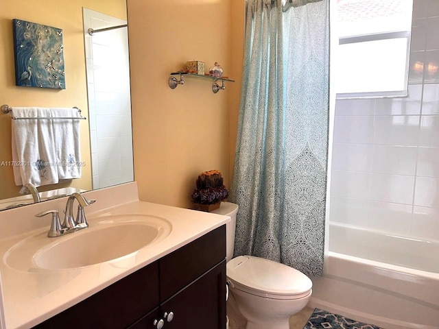 bathroom with vanity, toilet, and shower / bathtub combination with curtain