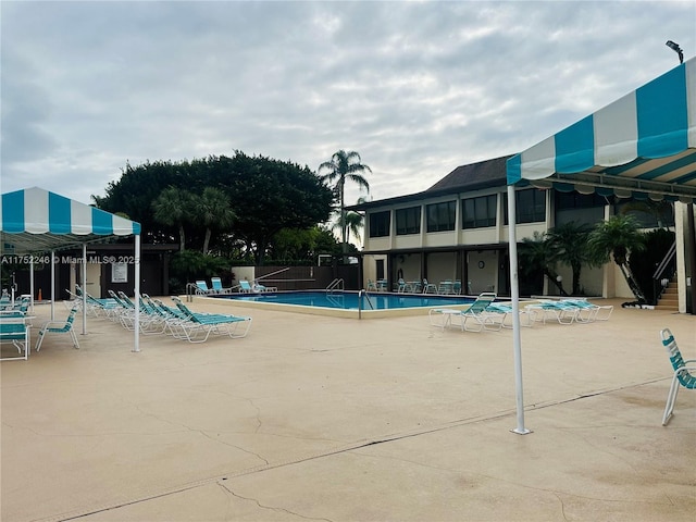 community pool featuring a patio