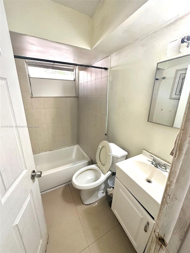 full bath featuring vanity, tile patterned flooring, and toilet