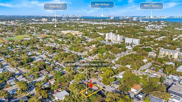 birds eye view of property featuring a city view