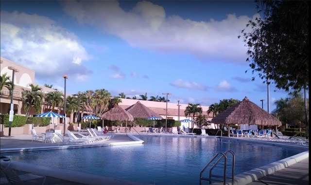 pool featuring a patio area and a gazebo