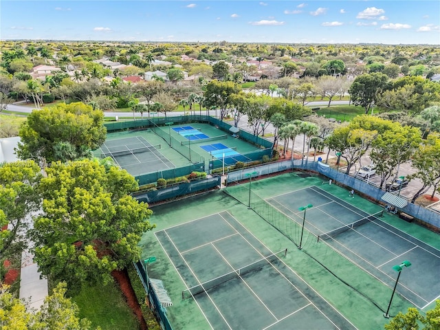 view of sport court with fence