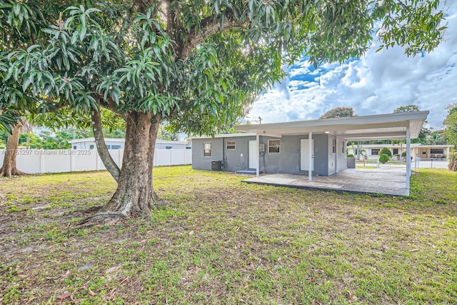 view of yard featuring a patio area and fence