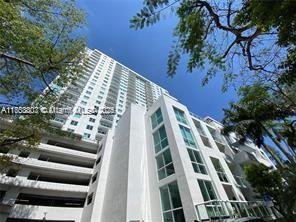 view of property with a water view