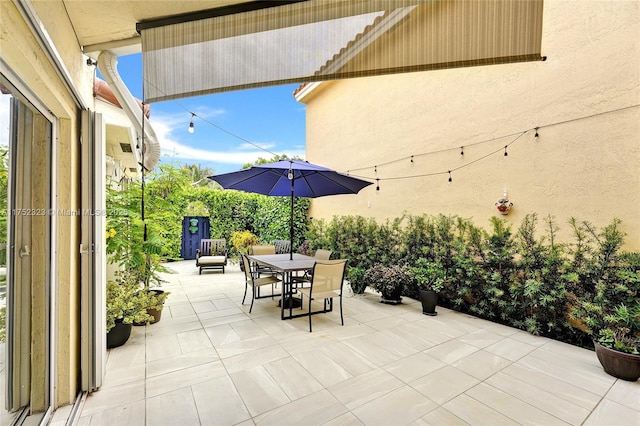 view of patio with outdoor dining area