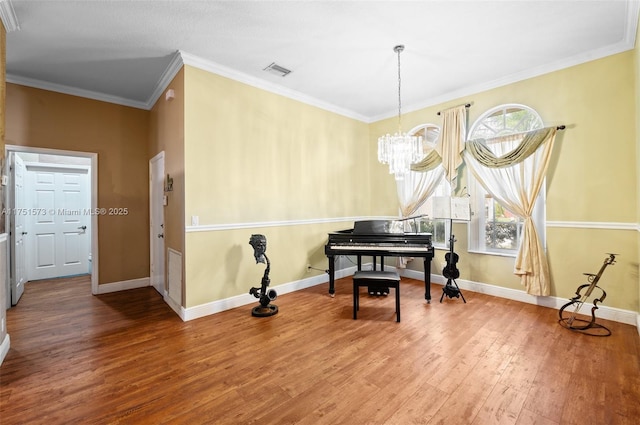 16358 S Mariposa Cir S, Pembroke Pines, FL 33331 - sitting room featuring crown molding, wood finished floors, baseboards, and visible vents