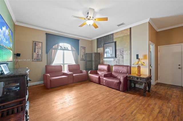 16358 S Mariposa Cir S, Pembroke Pines, FL 33331 - living room featuring visible vents, a ceiling fan, crown molding, and wood finished floors