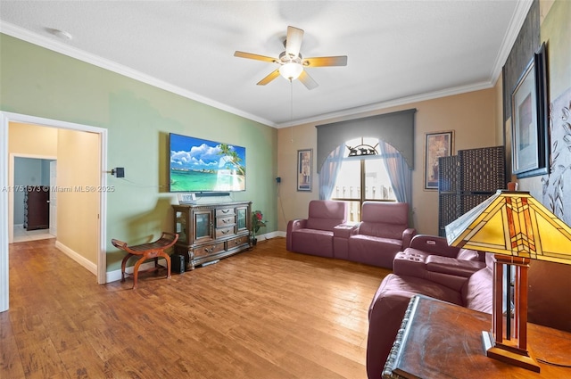 16358 S Mariposa Cir S, Pembroke Pines, FL 33331 - living room with wood finished floors, baseboards, ornamental molding, and ceiling fan