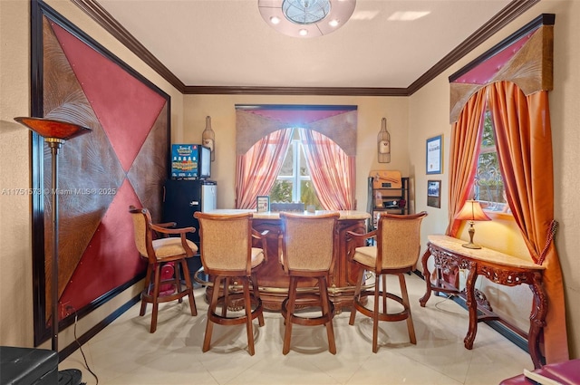 16358 S Mariposa Cir S, Pembroke Pines, FL 33331 - dining area featuring ornamental molding and a bar