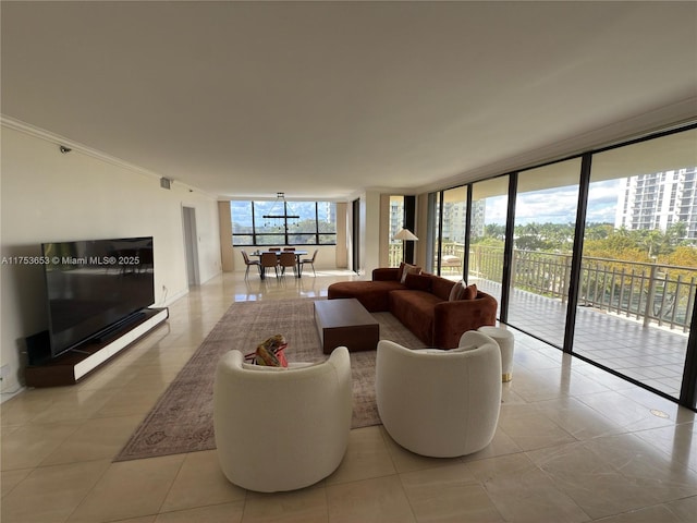 living area featuring expansive windows, ornamental molding, plenty of natural light, and light tile patterned flooring