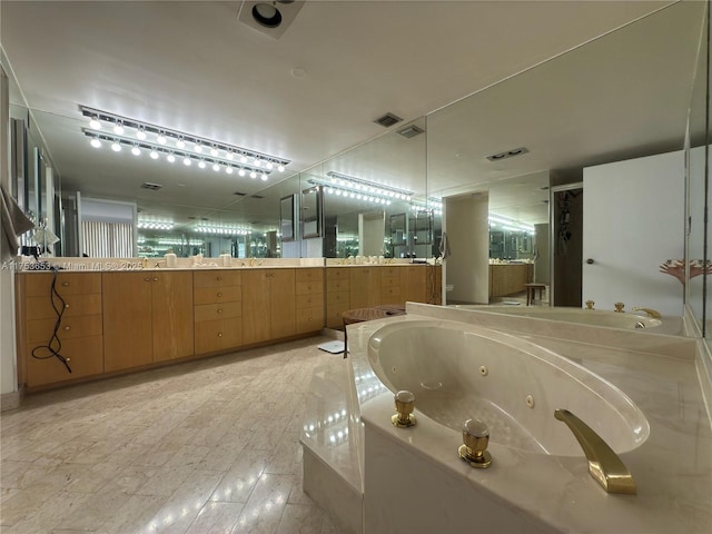 full bath featuring a stall shower, visible vents, vanity, and a tub with jets