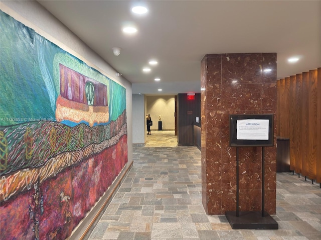 hallway featuring recessed lighting