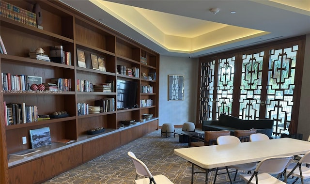 home office featuring a tray ceiling