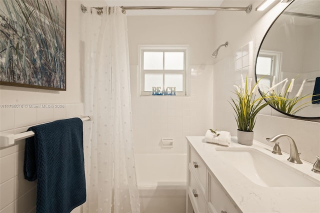 1109 NE 3rd St, Fort Lauderdale, FL 33301 - full bath with vanity, tile walls, and shower / bath combo with shower curtain