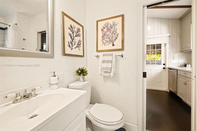 1109 NE 3rd St, Fort Lauderdale, FL 33301 - full bath featuring a shower with curtain, vanity, toilet, a textured wall, and wood finished floors