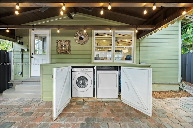 1109 NE 3rd St, Fort Lauderdale, FL 33301 - entrance to property with a patio area, washer and dryer, and fence