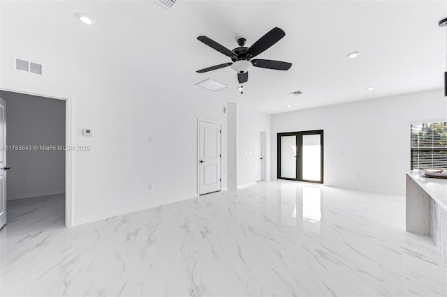 unfurnished living room featuring marble finish floor, recessed lighting, visible vents, ceiling fan, and baseboards