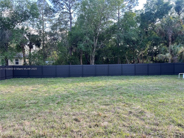 view of yard featuring fence