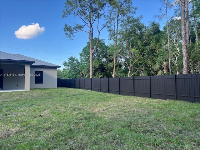 view of yard featuring fence