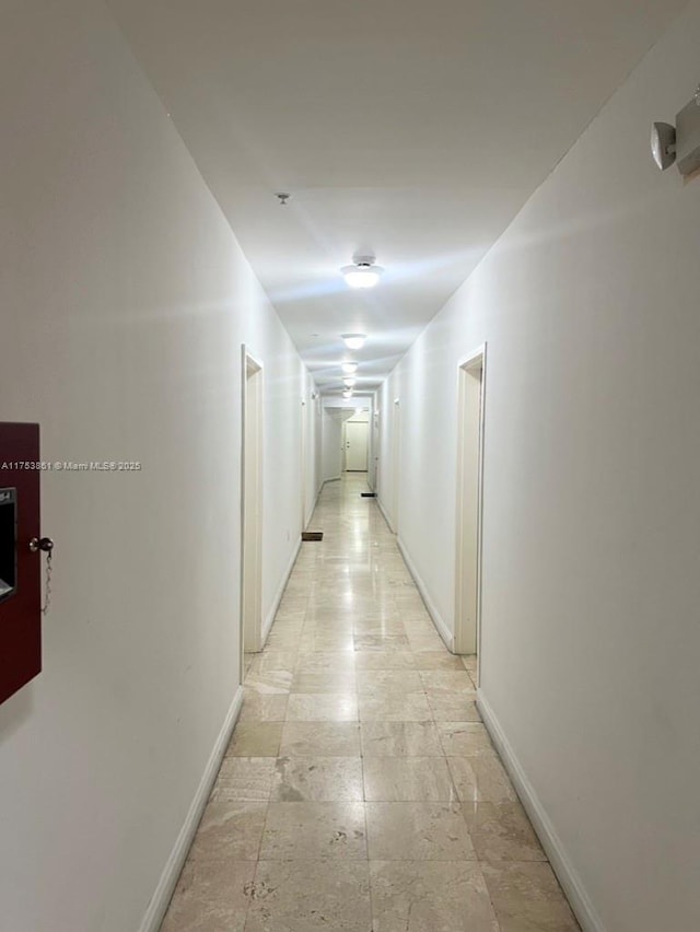 corridor with baseboards