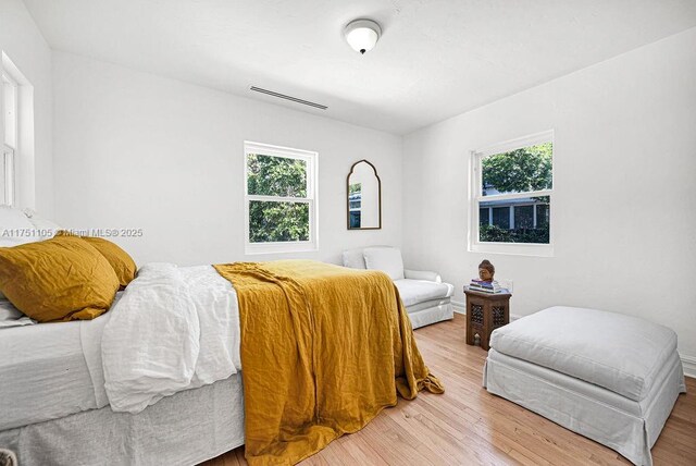 bedroom with light wood-style floors