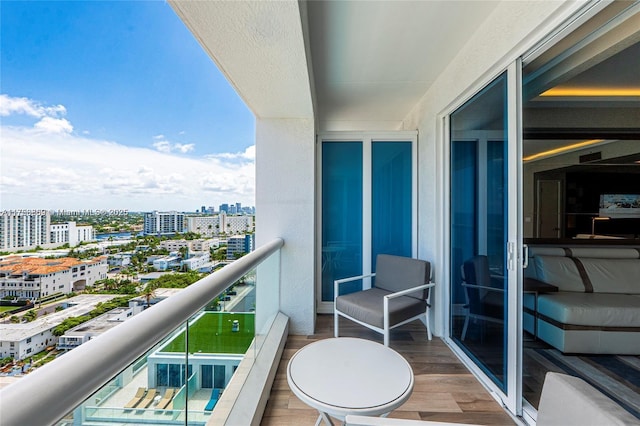 balcony featuring a view of city