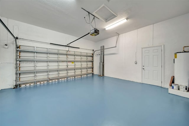 garage featuring gas water heater and a garage door opener