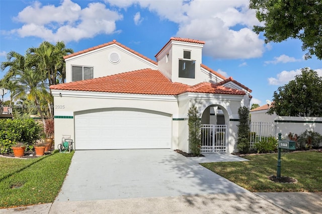 mediterranean / spanish-style house featuring a tile roof, stucco siding, an attached garage, fence, and driveway