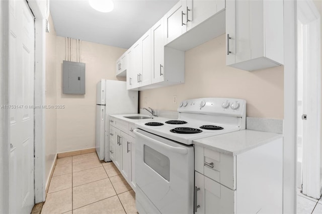 kitchen with white cabinets, white appliances, electric panel, and light tile patterned floors