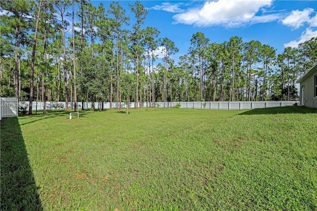 view of yard with fence