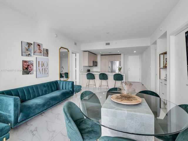 2000 Metropica Way Unit 1507, Sunrise, FL 33323 - dining area featuring marble finish floor, visible vents, and recessed lighting