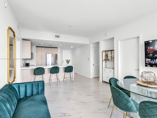 2000 Metropica Way Unit 1507, Sunrise, FL 33323 - living room featuring marble finish floor and visible vents