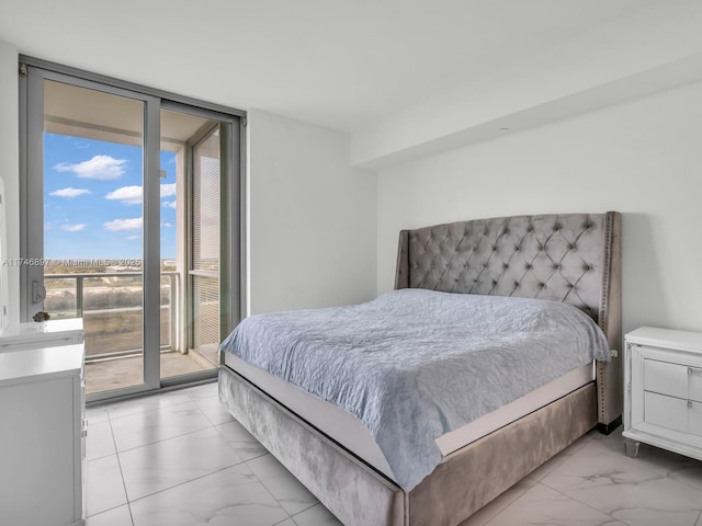 2000 Metropica Way Unit 1507, Sunrise, FL 33323 - bedroom with a wall of windows, access to outside, and marble finish floor