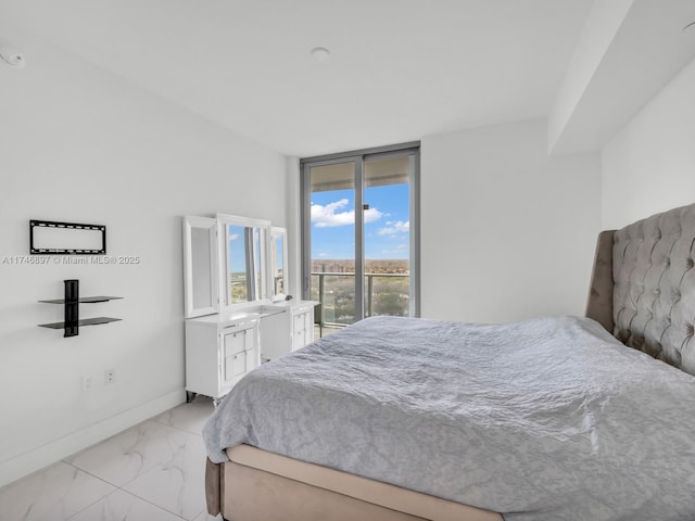 2000 Metropica Way Unit 1507, Sunrise, FL 33323 - bedroom featuring access to outside, marble finish floor, floor to ceiling windows, and baseboards