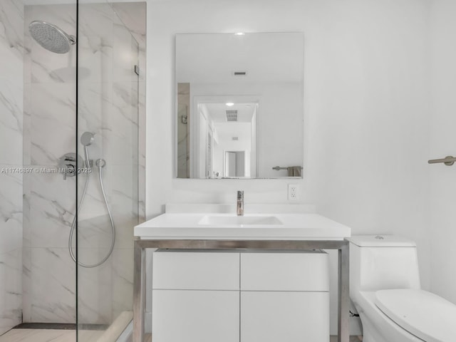 2000 Metropica Way Unit 1507, Sunrise, FL 33323 - bathroom with toilet, a marble finish shower, visible vents, and vanity