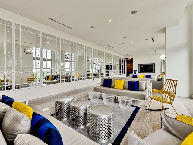 2000 Metropica Way Unit 1507, Sunrise, FL 33323 - living room with recessed lighting and wood finished floors