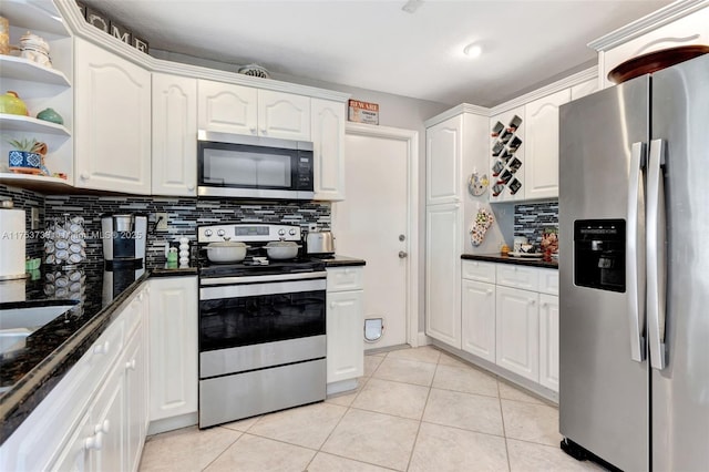 6820 NW 17th Ct, Margate, FL 33063 - kitchen featuring light tile patterned floors, open shelves, stainless steel appliances, decorative backsplash, and white cabinets