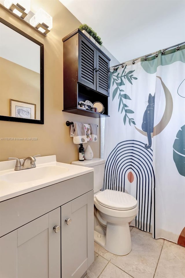 6820 NW 17th Ct, Margate, FL 33063 - full bathroom featuring tile patterned floors, curtained shower, toilet, and vanity