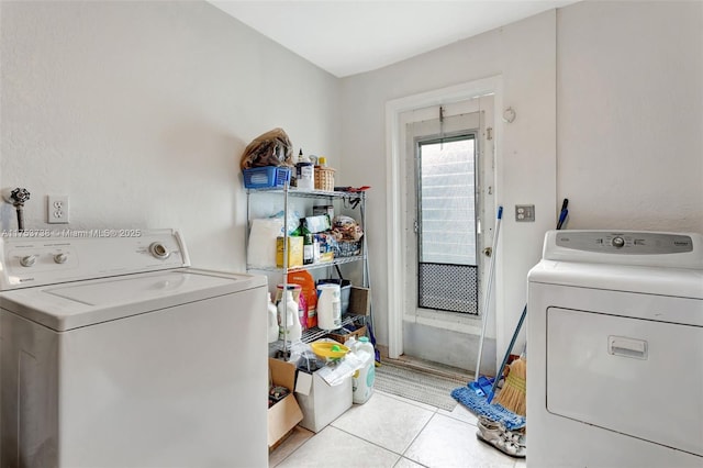 6820 NW 17th Ct, Margate, FL 33063 - laundry area featuring light tile patterned floors, laundry area, and independent washer and dryer