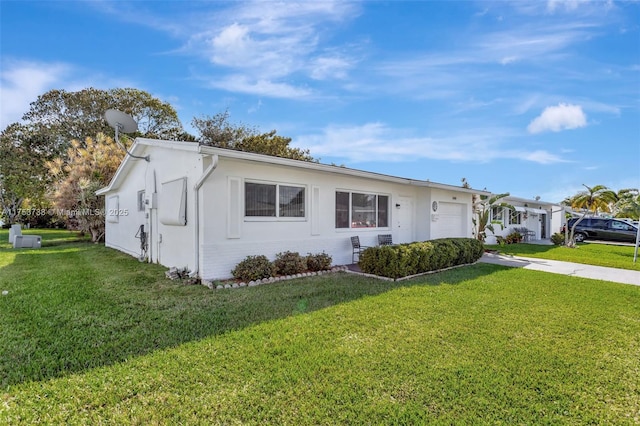 6820 NW 17th Ct, Margate, FL 33063 - ranch-style house featuring a garage, a front lawn, driveway, and stucco siding