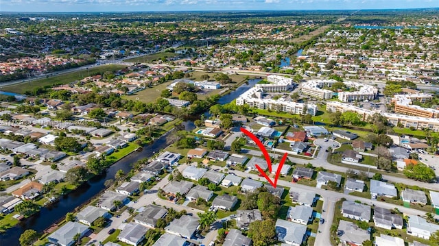 6820 NW 17th Ct, Margate, FL 33063 - drone / aerial view with a residential view and a water view
